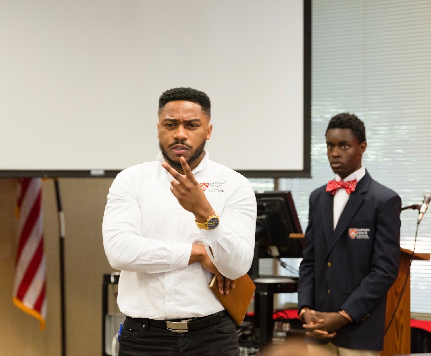 (Pictured: Osazi looking upon instructor Brandon Fleming during class.)